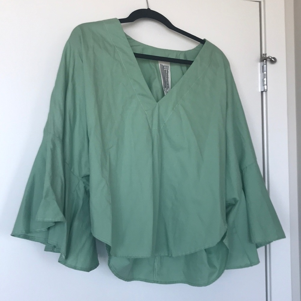 Free People Mint green flowy top.